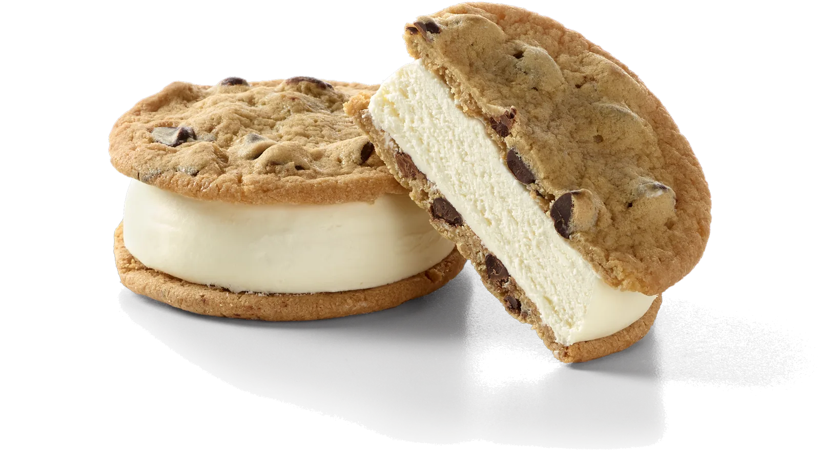 A Chessters frozen custard cookie sandwich, one whole and one cut open to show the dense vanilla custard
